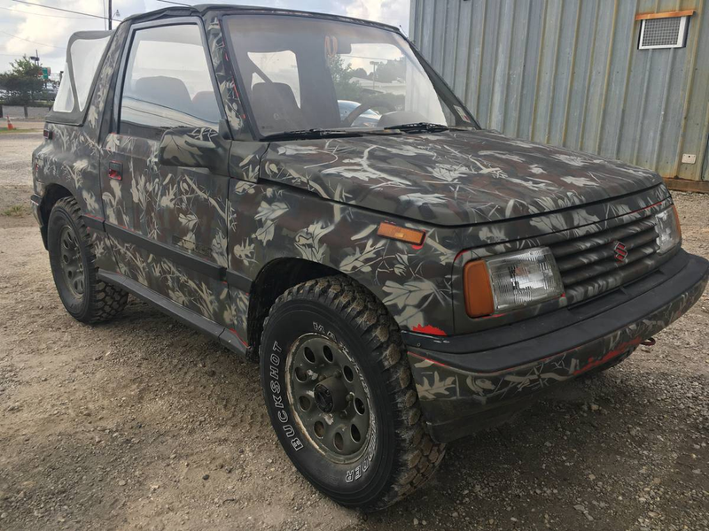 Illustration for article titled For $2,500, Could You See Yourself In This 1989 Suzuki Sidekick Hunting Truck?